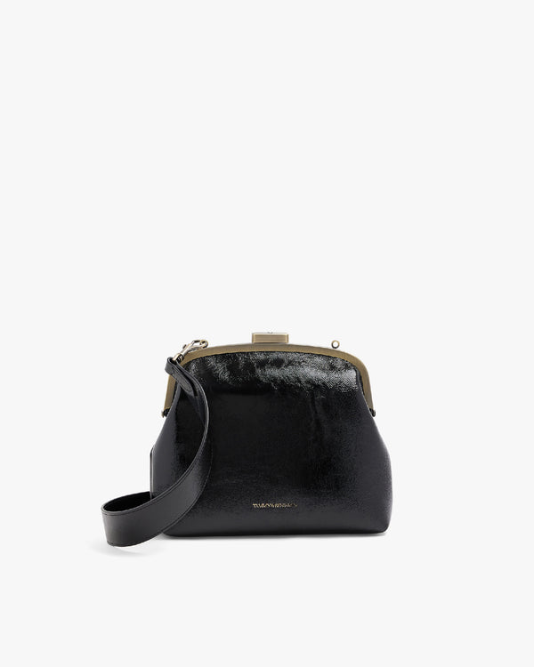 Sac EMMA noir naplak, vue de face légèrement en angle, fermoir métallique et bandoulière détachable visibles
